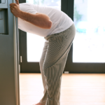 Man looking into fridge