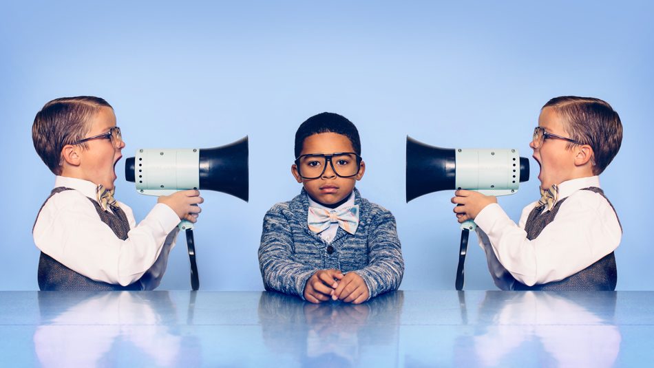 Two professional kids yelling with bullhorns at middle kid on light blue background